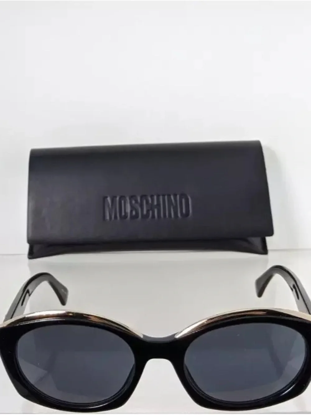 Moschino Black and Gold Cat Eye Sunglasses